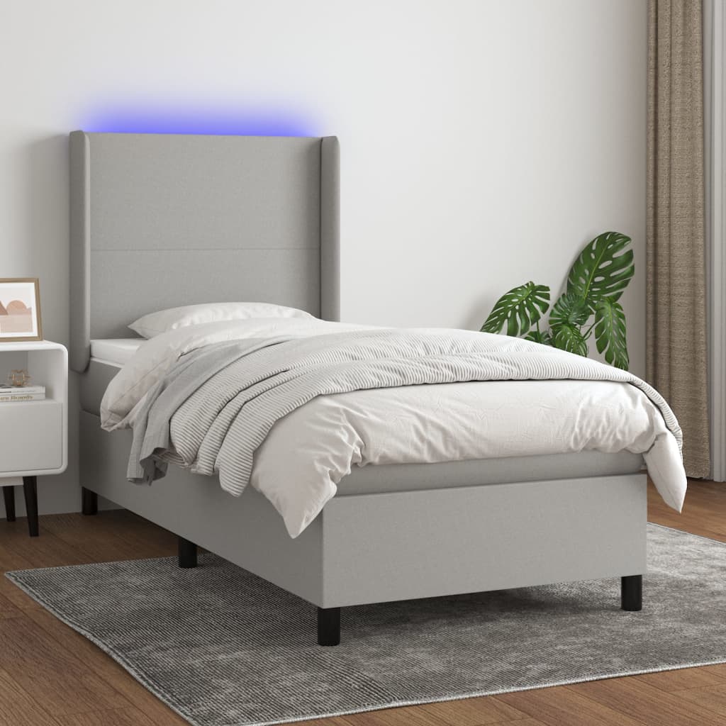 JUNG Vida Boxspringbett mit Matratze & LED Hellgrau 90x190 cm Stoff