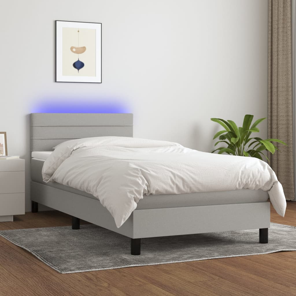 JUNG Vida Boxspringbett mit Matratze & LED Hellgrau 90x200 cm Stoff