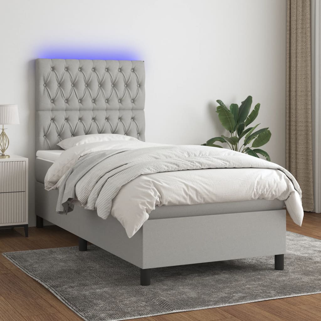 JUNG Vida Boxspringbett mit Matratze & LED Hellgrau 90x190 cm Stoff